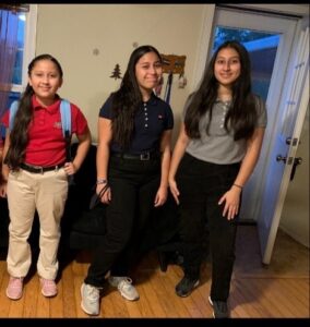 Three Guerrero children standing together